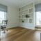 Office with wooden floor