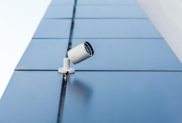 one security camera on office building, security system concept