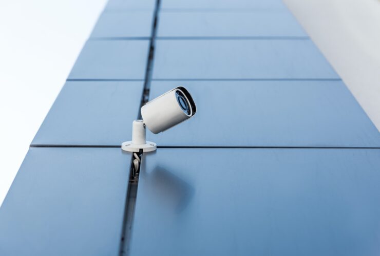 one security camera on office building, security system concept