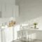 sunlight in white modern kitchen with cooking utensils