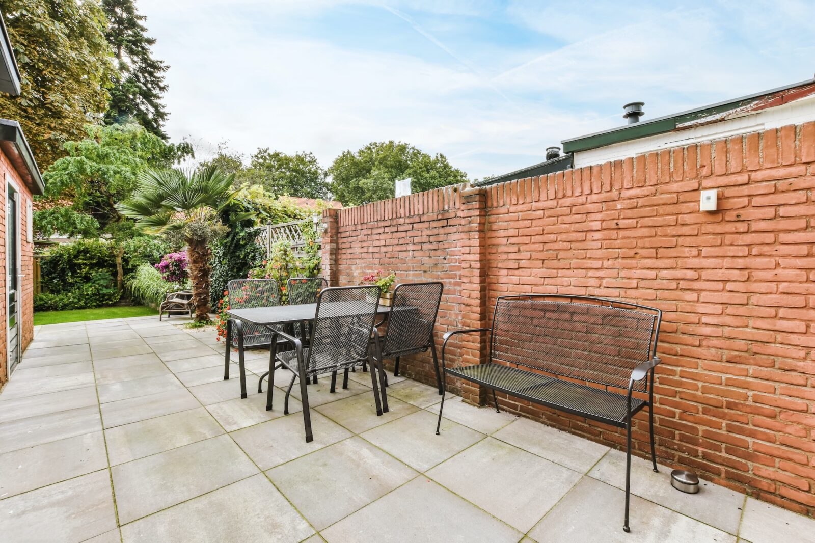 Backyard with wicker furniture
