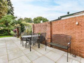 Backyard with wicker furniture