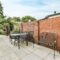 Backyard with wicker furniture