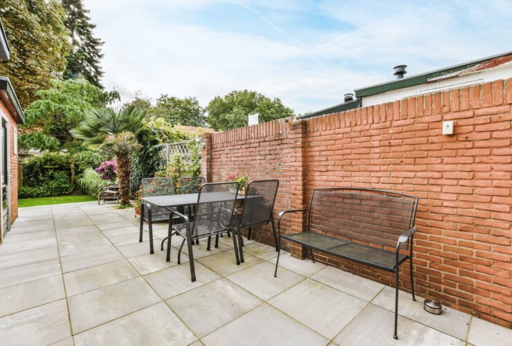 Backyard with wicker furniture