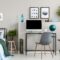 Branches of spruce in glass vases in classy bedroom and workspac