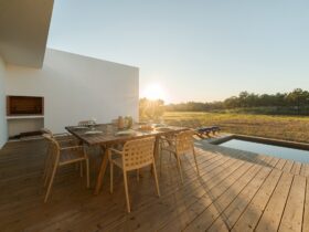 Dinner table setting in modern villa terrace