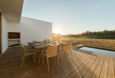 Dinner table setting in modern villa terrace