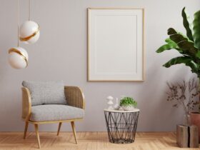 Mock up poster frame in modern interior on dark plaster wall.