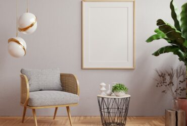 Mock up poster frame in modern interior on dark plaster wall.
