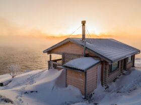 Wooden house on the beach in winter