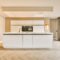 A minimalist kitchen with a block system in white design