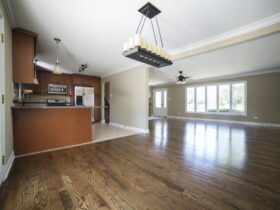 Empty Kitchen And Living Room In House