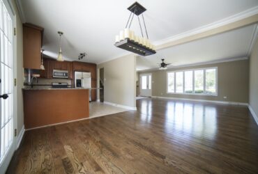 Empty Kitchen And Living Room In House