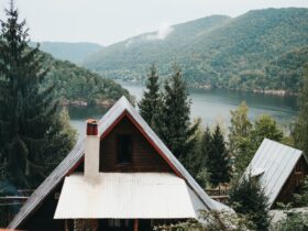 House near amazing lake near mountains