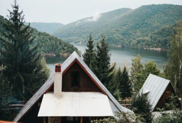 House near amazing lake near mountains