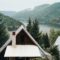 House near amazing lake near mountains
