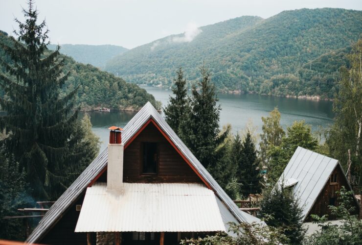 House near amazing lake near mountains