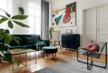 Luxury and modern home interior with design green sofa.