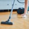 Picture of woman cleaning house using vacuum