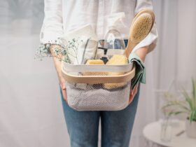 Woman holding basket with cleaning equipment. A woman is doing spring cleaning. The concept of house