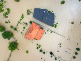 Aerial view of flooded houses with dirty water of Dnister river in Halych town, western Ukraine