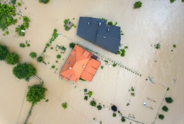 Aerial view of flooded houses with dirty water of Dnister river in Halych town, western Ukraine