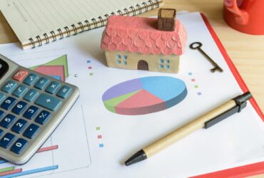 Home finance concept, residential house, expenses calculated