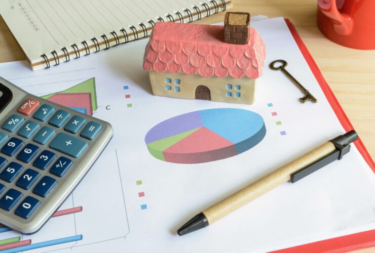 Home finance concept, residential house, expenses calculated