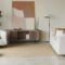 Interior design of stylish living room with modern neutral sofa