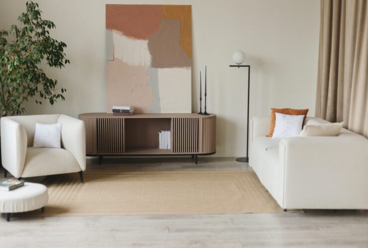 Interior design of stylish living room with modern neutral sofa