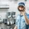 Man choosing pipes in the plumbing shop
