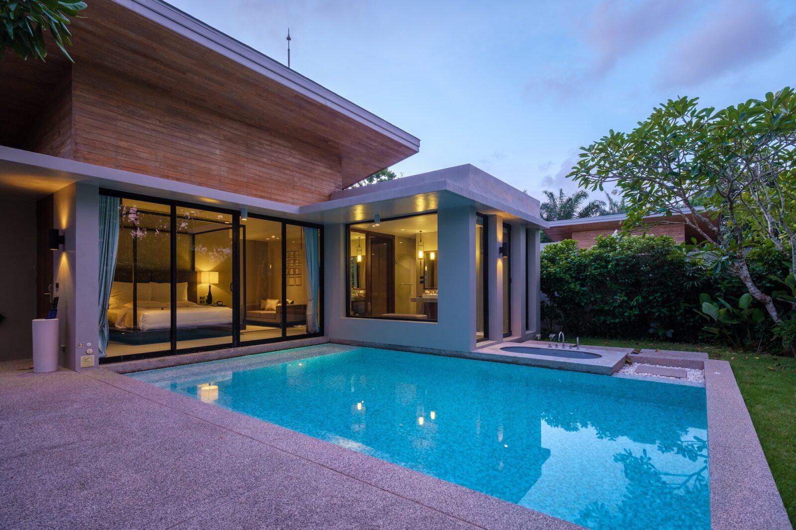 Modern house with a swimming pool, modern pool villa at the beach