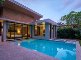 Modern house with a swimming pool, modern pool villa at the beach