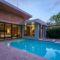 Modern house with a swimming pool, modern pool villa at the beach