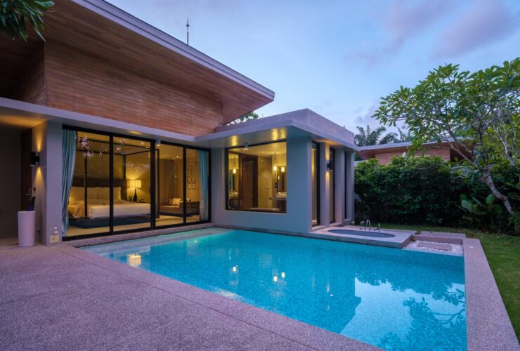 Modern house with a swimming pool, modern pool villa at the beach