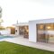 Modern house with garden swimming pool and wooden deck