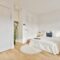 Modern room with white bed