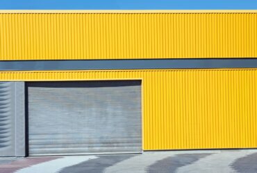 New Modern Garage Door in Unfinish Exterior Yellow Metal Wall