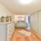 Small bedroom with wooden furniture