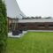 Spacious backyard with porch