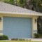 Wide garage double door and concrete driveway of new modern american house