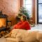 Woman with dog at home on a winter holidays
