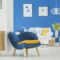Yellow accents in blue room