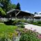 A landscaped carport patio in a typical middle class neighborhood