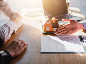 Business Signing a Contract Buy - sell house.