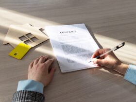 contract for the sale of a house.Home Mortgage Agreement, Real Estate Concept.symbol, wooden house