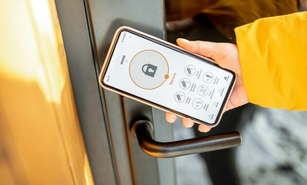 Locking entrance door with a smart phone