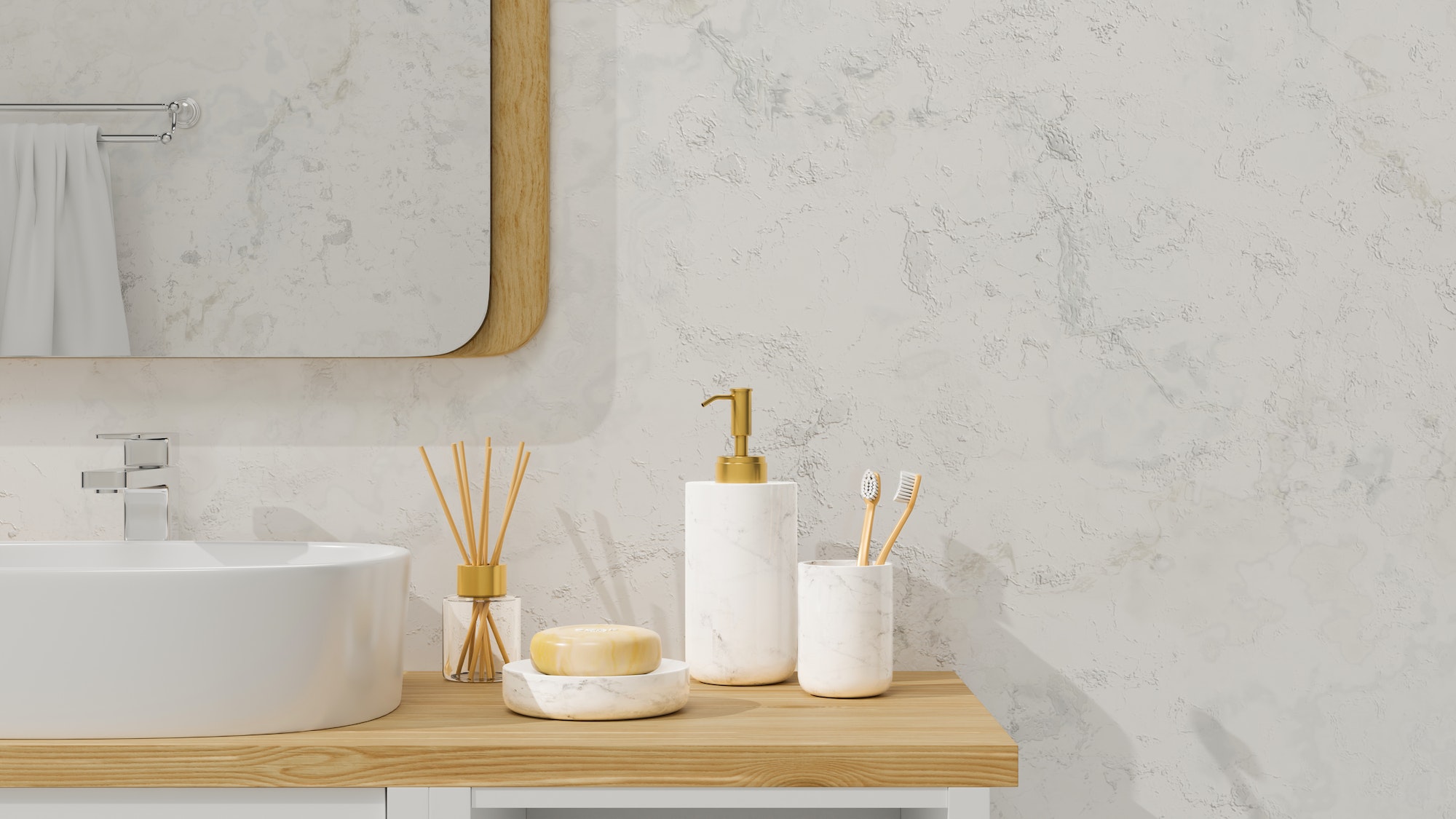 Modern bathroom interior with vessel sink, diffusers, soap, toothbrush, shampoo on wooden countertop