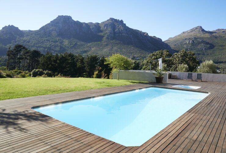 Outdoor Swimming Pool Surrounded With Wooden Decking