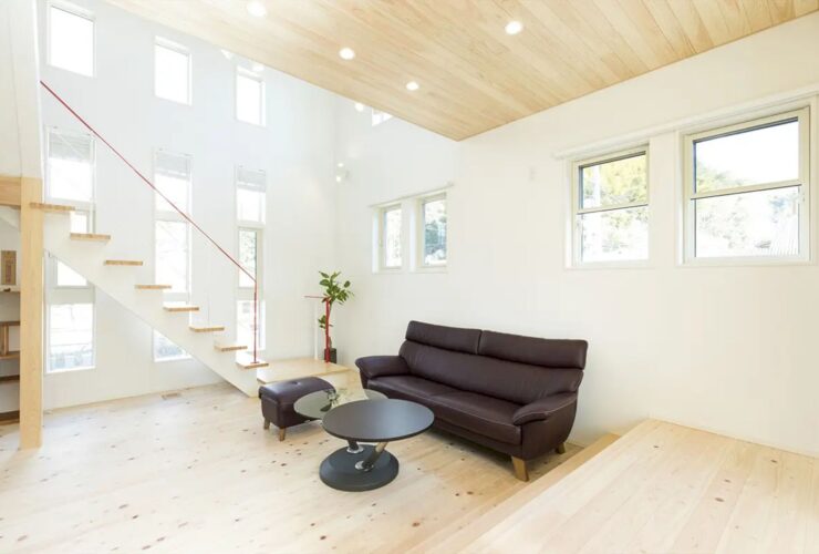 A Modern Japanese House With A Red Handrail On The Living Room Stairs 5